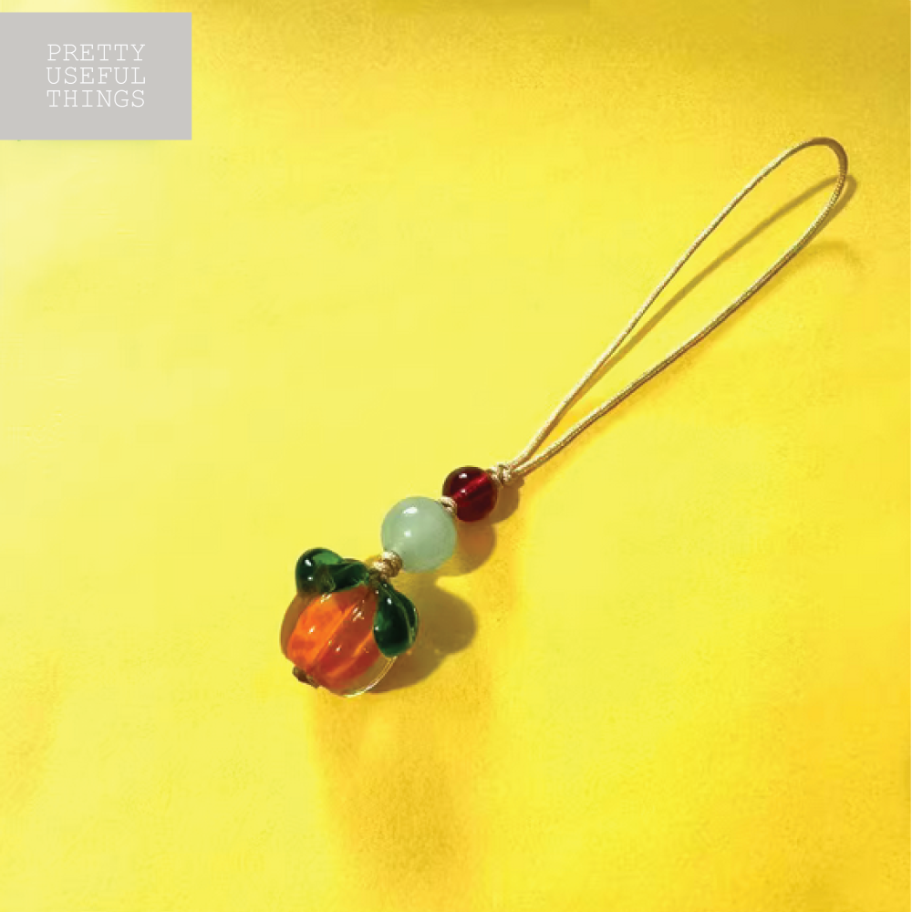 Sunlit Persimmon Phone Charm